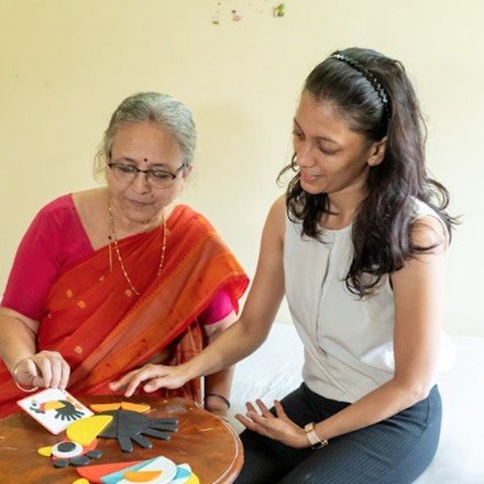 Care Manager assessing elderly mother's daily routine